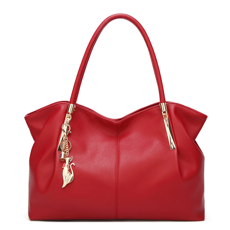 Black Shoulder Bag with Gold Hardware & Cat Charm